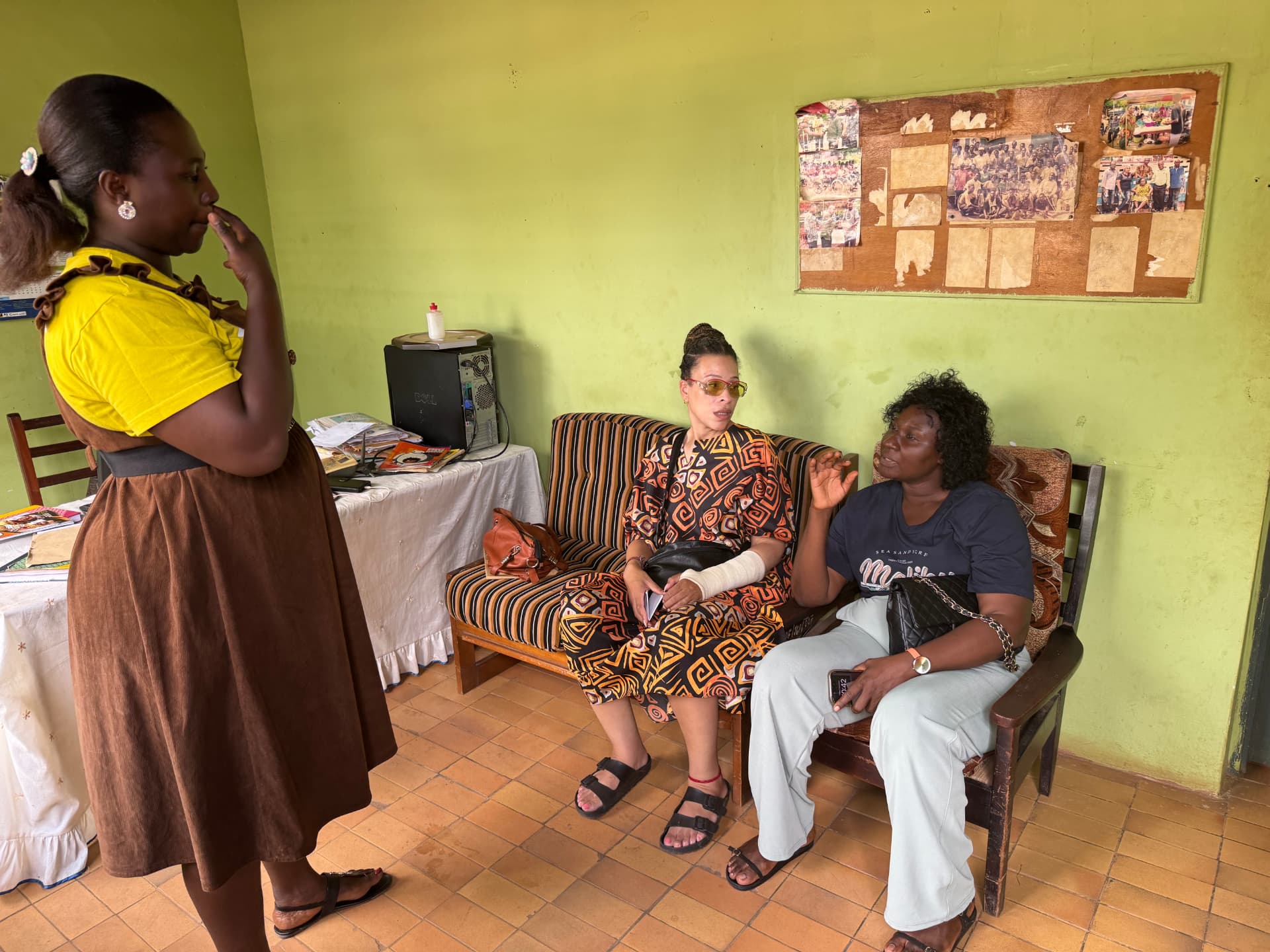 RANT team members in discussion with a school staff member in her office
