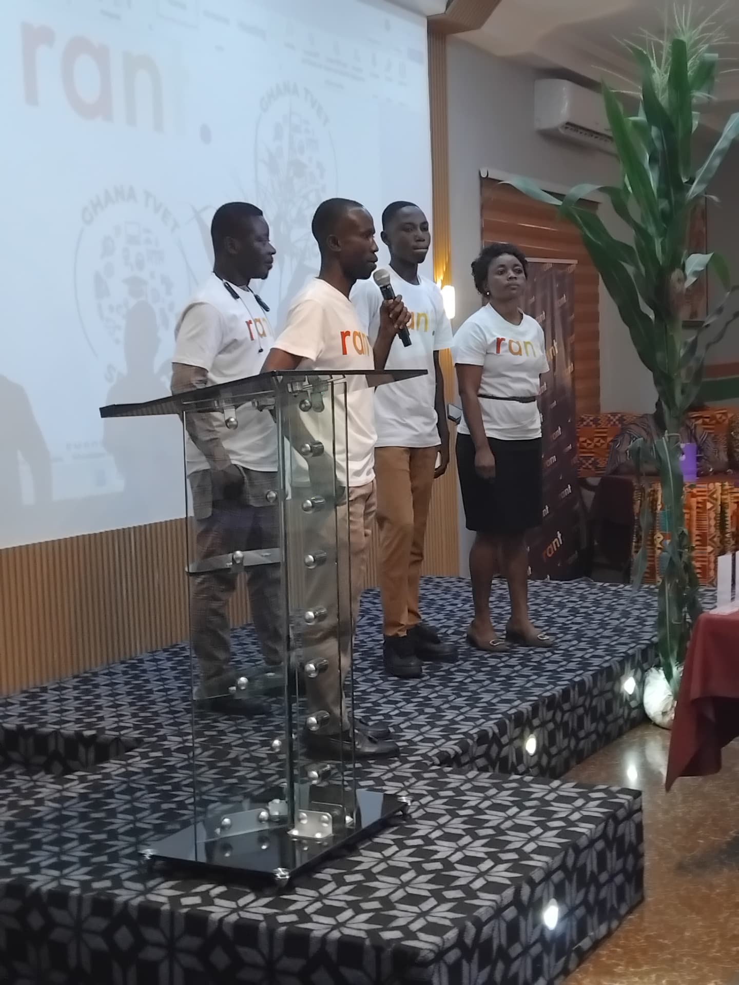 TVET school representatives in RANT t-shirts presenting their enterprise clubs on stage